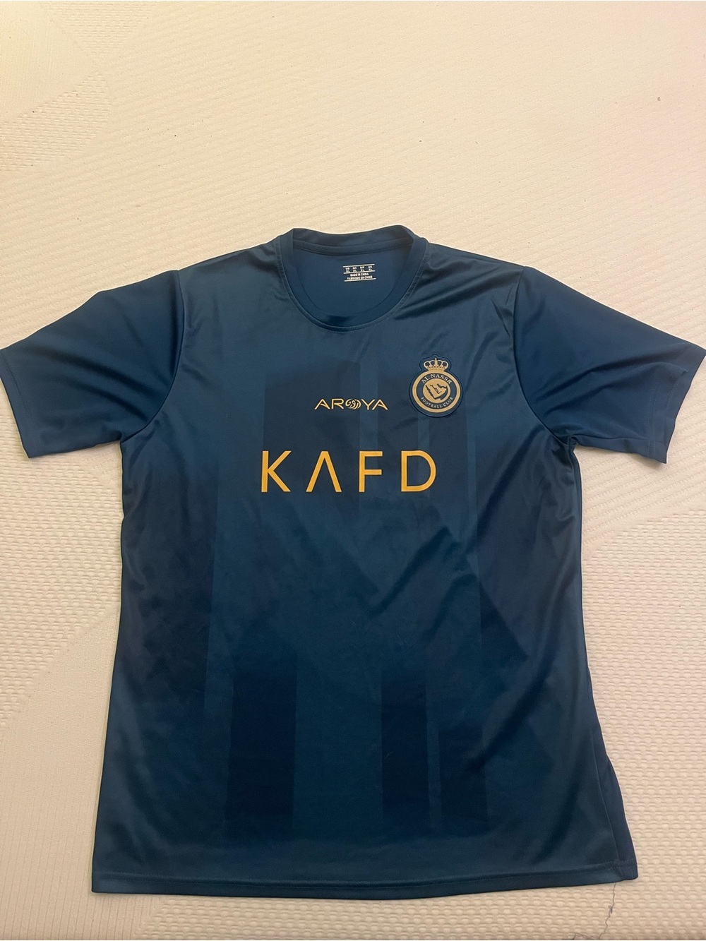 Dark Blue Soccer Jersey with Gold Accents